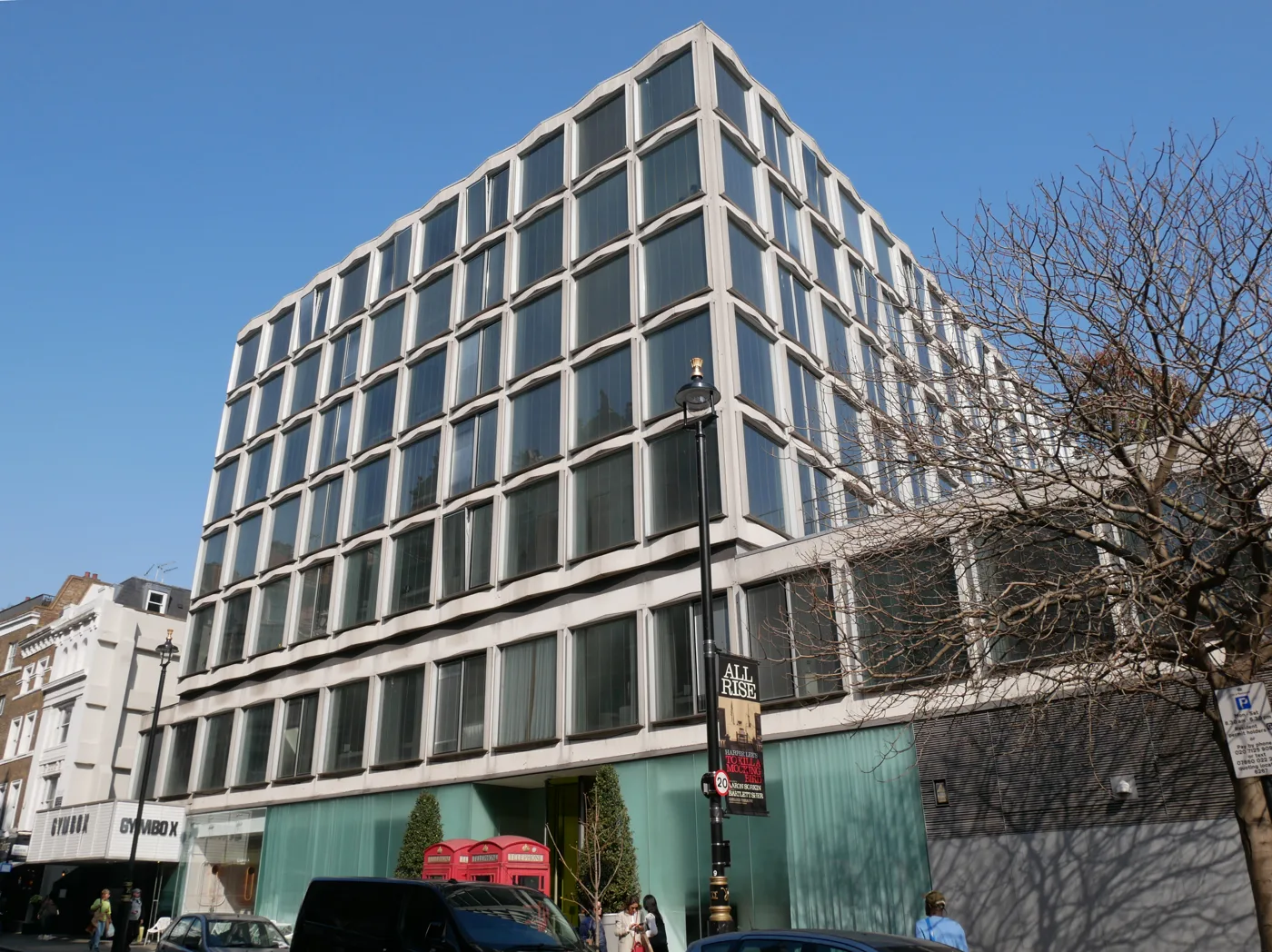 The St Martins Lane hotel building on St Martin's Lane, in an earlier photograph. The club's entrance is at ground level beside the hotel and both performance rooms are in the basement
