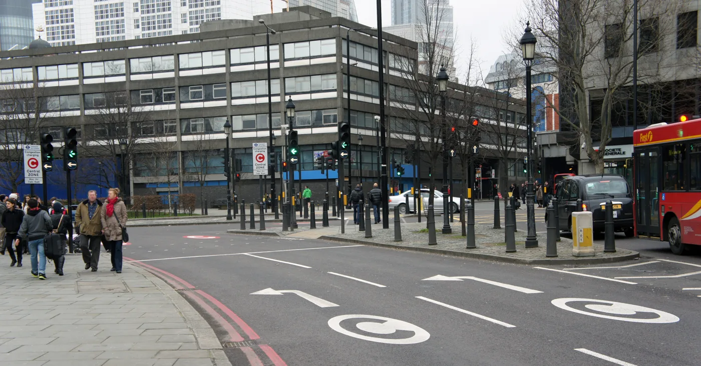 A Congestion Charge zone entry point in central London, with the C roundel painted on the carriageway. Charging hours have changed since this photograph was taken.